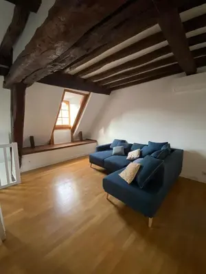 Coin salon dans l'établissement Appartement coeur de Beaune