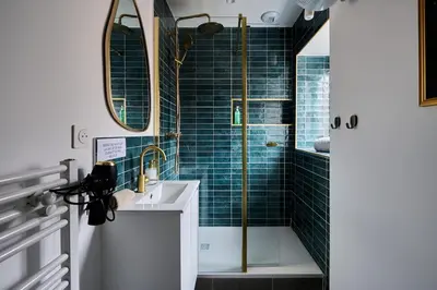 Salle de bains dans l'établissement Le Jungle