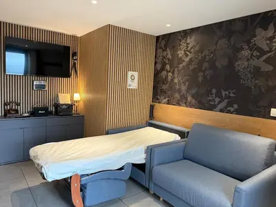 Coin salon dans l'établissement Lodge avec Spa extérieur privé en option et mini-ferme sur place