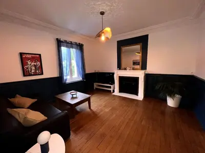 Coin salon dans l'établissement Appartement Coeur du Creusot