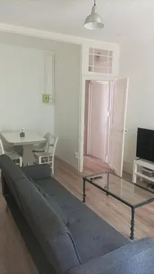 Télévision ou salle de divertissement dans l'établissement Appartement familial Fleur de coton - centre-ville