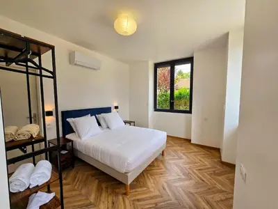 Un ou plusieurs lits dans un hébergement de l'établissement L'appartement 1 by Vindihouses