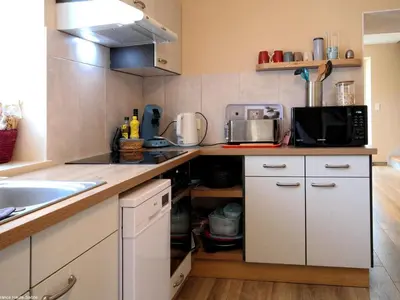 Cuisine ou kitchenette dans l'établissement Charmant gîte rénové avec terrasse et parking au cœur de Montagney - FR-1-583-482