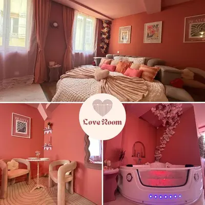 Un ou plusieurs lits dans un hébergement de l'établissement LE LOVE-ROOM, Jacuzzi, Hyper-centre
