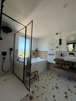 Un ou plusieurs lits dans un hébergement de l'établissement Jolie Maison avec Balnéothérapie