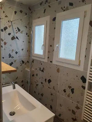 Salle de bains dans l'établissement L'Aubier