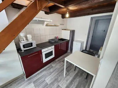 Cuisine ou kitchenette dans l'établissement L'appartement d'Edmond Bour
