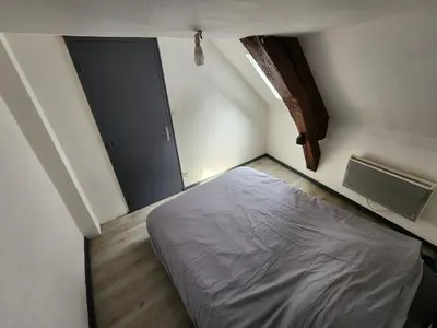 Un ou plusieurs lits dans un hébergement de l'établissement L'appartement d'Edmond Bour