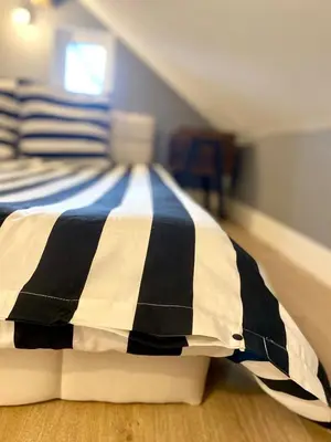 Un ou plusieurs lits dans un hébergement de l'établissement Dijon hyper-centre Le Casa Dauphine