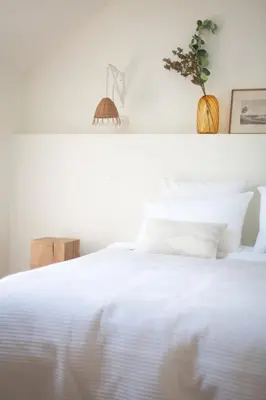 Un ou plusieurs lits dans un hébergement de l'établissement La Maison de Givry