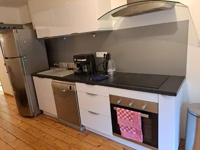 Cuisine ou kitchenette dans l'établissement Lons centre studio 16 commerce