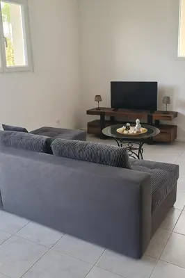 Télévision ou salle de divertissement dans l'établissement Maison les berges du lac