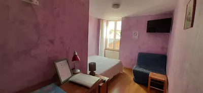 Télévision ou salle de divertissement dans l'établissement Le Marmagne