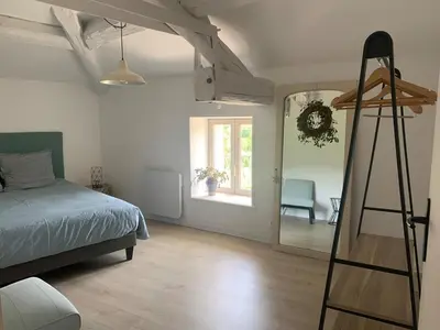 Un ou plusieurs lits dans un hébergement de l'établissement Charming house