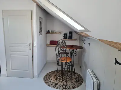 Cuisine ou kitchenette dans l'établissement La Cachette