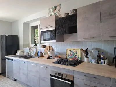 Cuisine ou kitchenette dans l'établissement Maison de campagne avec jardin Chez nous