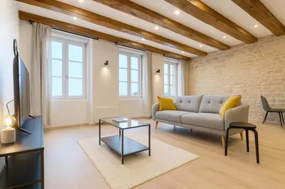 Coin salon dans l'établissement Le Prestige Mâconnais Calme Central Luxe
