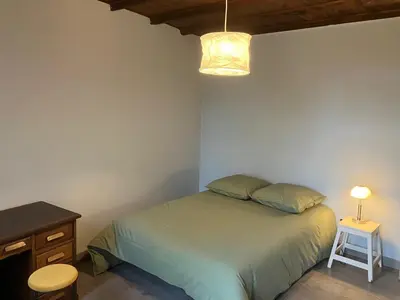 Un ou plusieurs lits dans un hébergement de l'établissement 4 bedroom family home