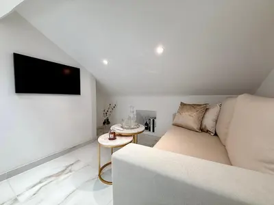 Un ou plusieurs lits dans un hébergement de l'établissement Le Loft Contemporain - Climatisé & Smart TV au coeur de Dijon