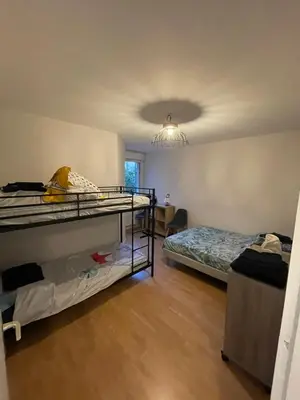 Un ou plusieurs lits dans un hébergement de l'établissement Magnifique logement hyper-centre-Paray-le-Monial