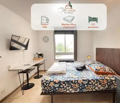 Un ou plusieurs lits dans un hébergement de l'établissement Studio centre ville Les logis de Paray 321