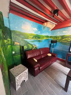 Coin salon dans l'établissement Gite la Vieille Auberge de Chaumard