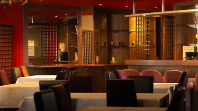 Coin salon dans l'établissement Logis Hôtel L'Orée des Charmes et son restaurant L'évYdenCe