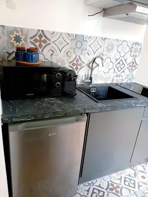 Cuisine ou kitchenette dans l'établissement Topaze - En plein coeur de la ville Dijon