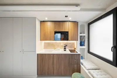 Cuisine ou kitchenette dans l'établissement Pavillon 15 Darcy - Appart-suites urbaines & design