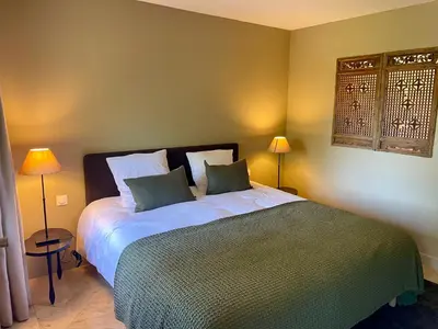 Un ou plusieurs lits dans un hébergement de l'établissement Chambre d'hôtes - Suite familiale accès privatif