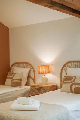 Un ou plusieurs lits dans un hébergement de l'établissement La ferme de Manon