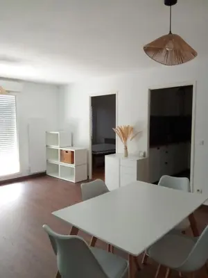 Télévision ou salle de divertissement dans l'établissement Appartement Mios