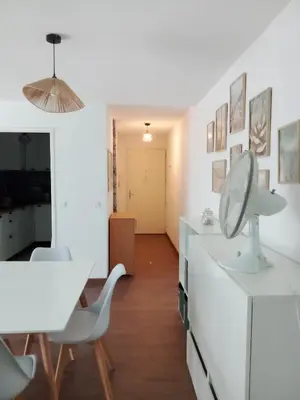 Coin salon dans l'établissement Appartement Mios