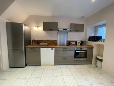 Cuisine ou kitchenette dans l'établissement Au Cœur d Orgelet