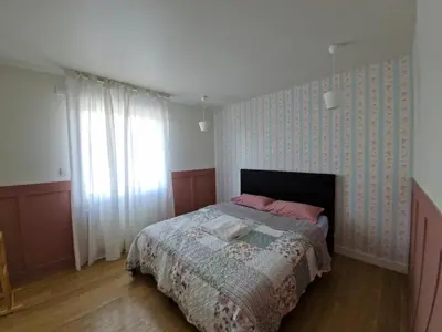 Un ou plusieurs lits dans un hébergement de l'établissement maison à la campagne