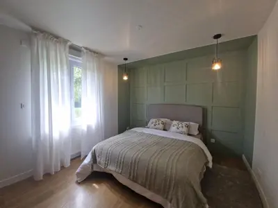 Un ou plusieurs lits dans un hébergement de l'établissement maison à la campagne