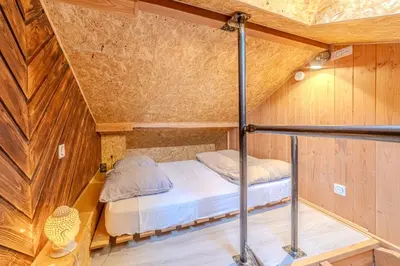 Un ou plusieurs lits dans un hébergement de l'établissement Secret Chalet - Climatisé avec 2200 m² de terrain