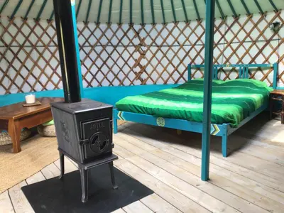 Un ou plusieurs lits dans un hébergement de l'établissement Yourte Morvan Insolite