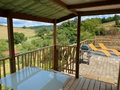 Balcon ou terrasse dans l'établissement Chalet Iris