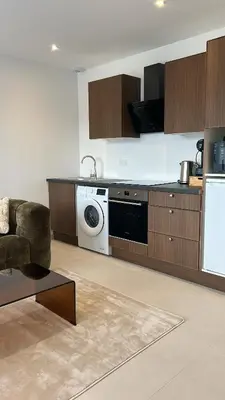 Cuisine ou kitchenette dans l'établissement Maison T2 moderne avec spa privatif