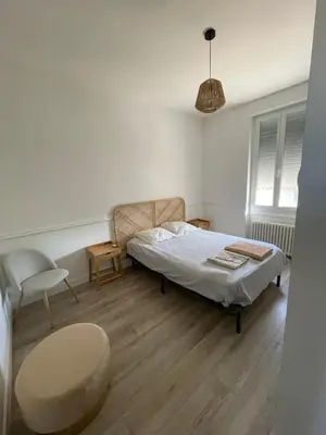 Un ou plusieurs lits dans un hébergement de l'établissement Maison rénovée proche centre ville