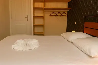 Un ou plusieurs lits dans un hébergement de l'établissement Le chic Calme - Central - Cosy