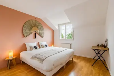 Un ou plusieurs lits dans un hébergement de l'établissement Jardin suspendu - 3 chambres - 2 salles de bain - Parking dans résidence privée