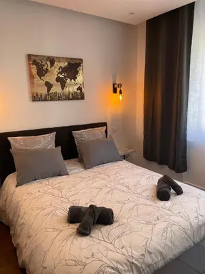 Un ou plusieurs lits dans un hébergement de l'établissement Appartement Premium - Le Trente
