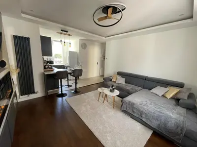 Coin salon dans l'établissement Appartement Premium - Le Trente