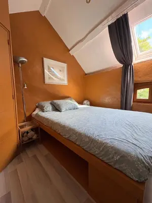 Un ou plusieurs lits dans un hébergement de l'établissement La Maison du bonheur - Gîte PIPA - Corancy