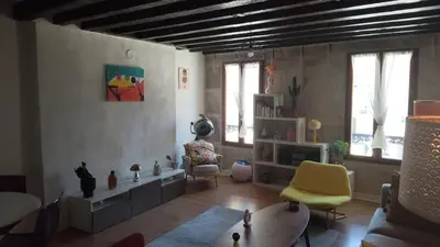 Coin salon dans l'établissement Appartement dans le centre historique
