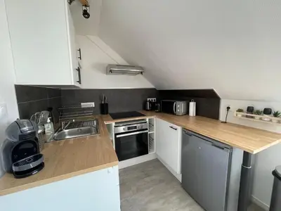 Cuisine ou kitchenette dans l'établissement LE SAINT LOUIS Dijon