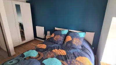 Un ou plusieurs lits dans un hébergement de l'établissement Joli appartement proche place Wilson - centre