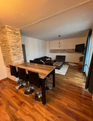 Coin salon dans l'établissement Appartement T2 rénové facultés 5 voyageurs